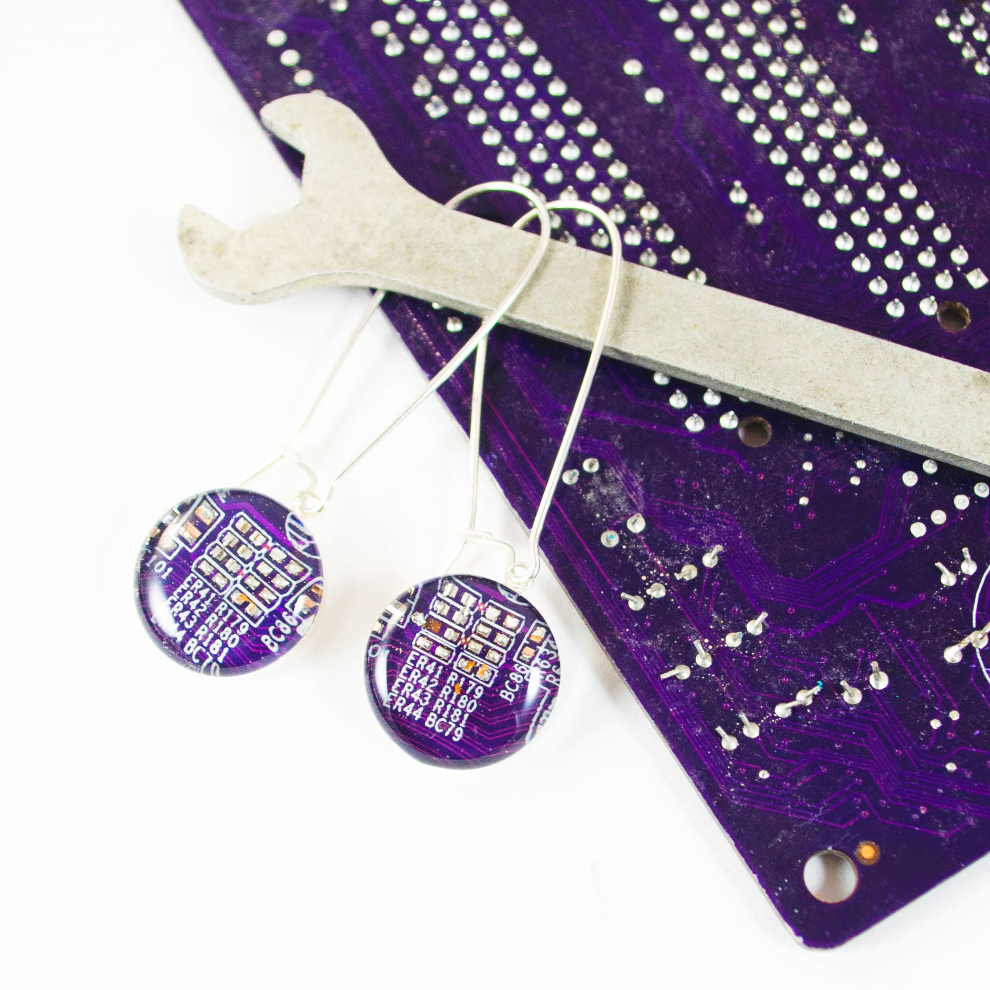 http://becausesciencedc.com/cdn/shop/collections/purple_circuit_board_dangle_earrings.png?v=1650295487