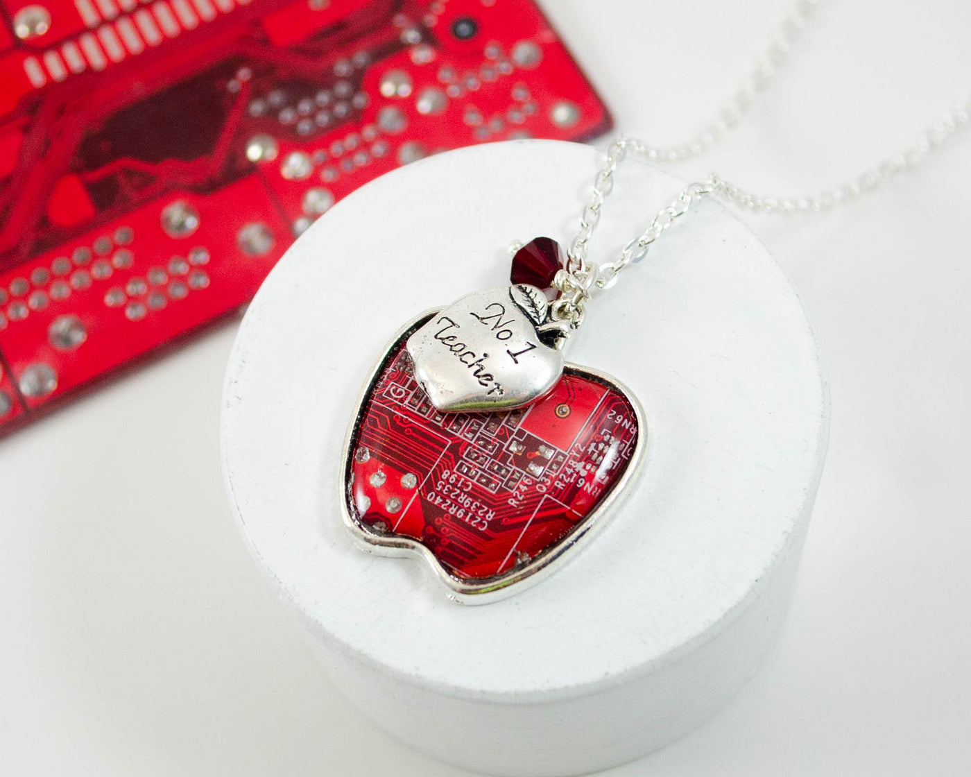 handmade circuit board necklace in shape of apple with number one teacher charm