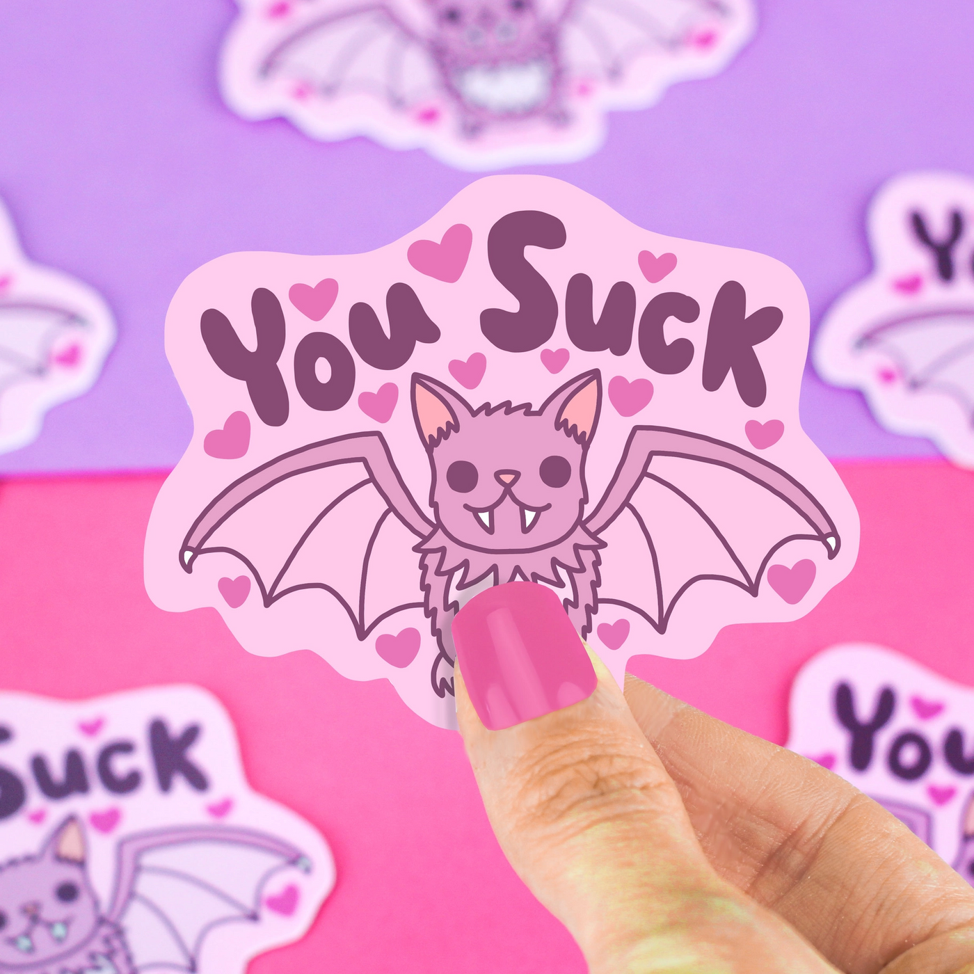 cute fruit bat illustrated sticker with slogan that says you suck