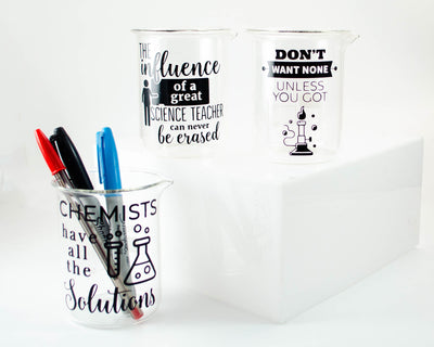 handmade beaker pencil cups with chemistry sayings and puns like chemists have all the solutions and dont want none unless you got bunsen