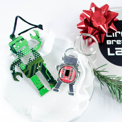 handmade gift set made from recycled computer motherboards that includes a robot keychain and robot ornament