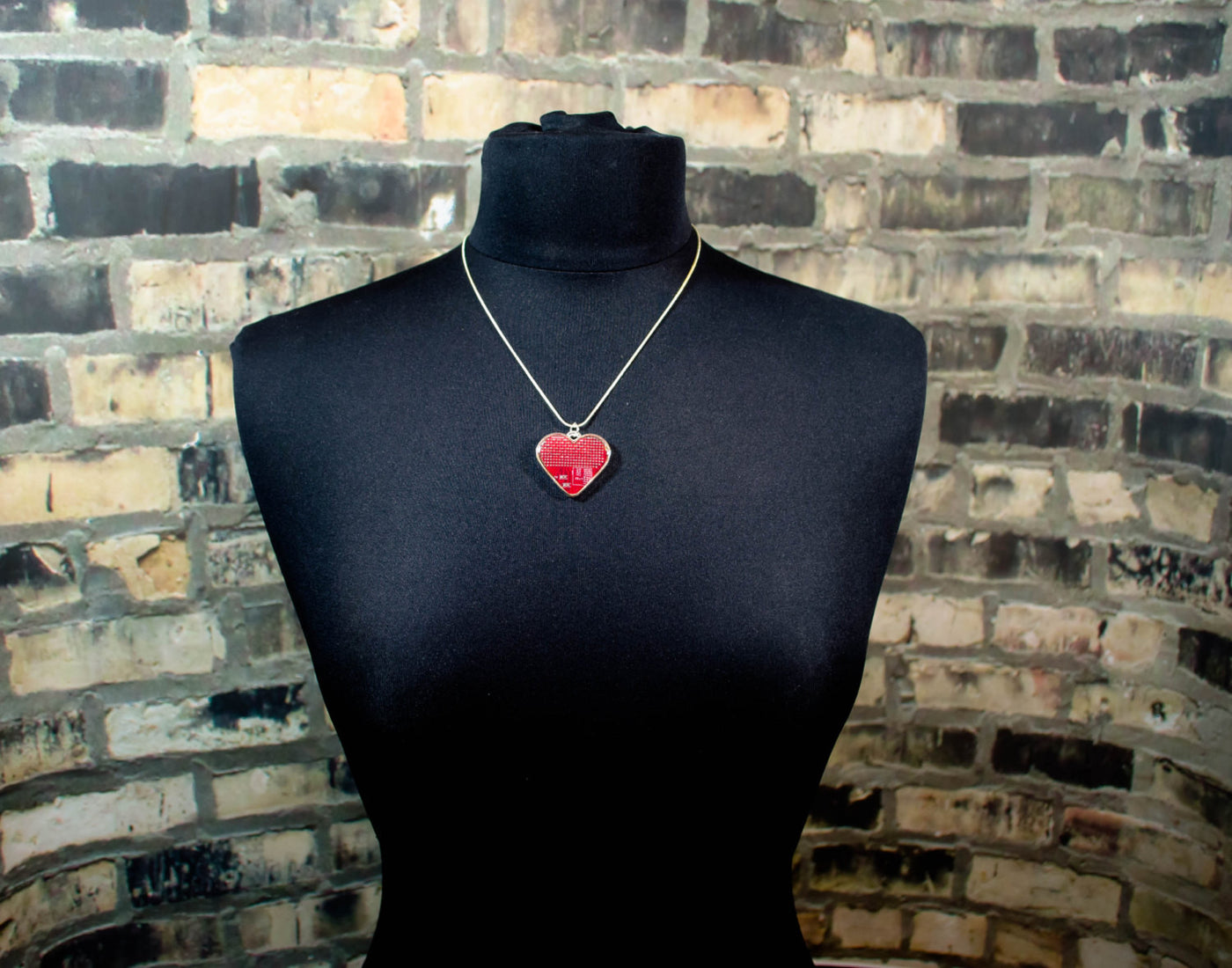 heart necklace on mannequin