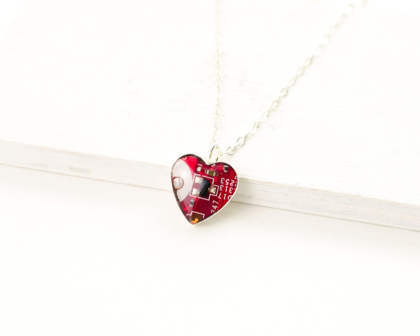 red circuit board silver heart necklace