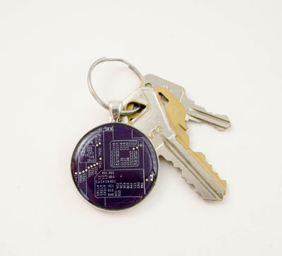 violet recycled circuit board keychain