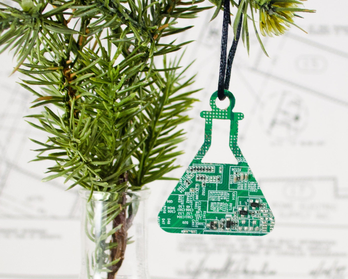 green circuit board upcycled into an Erlenmeyer flask ornament for chemists