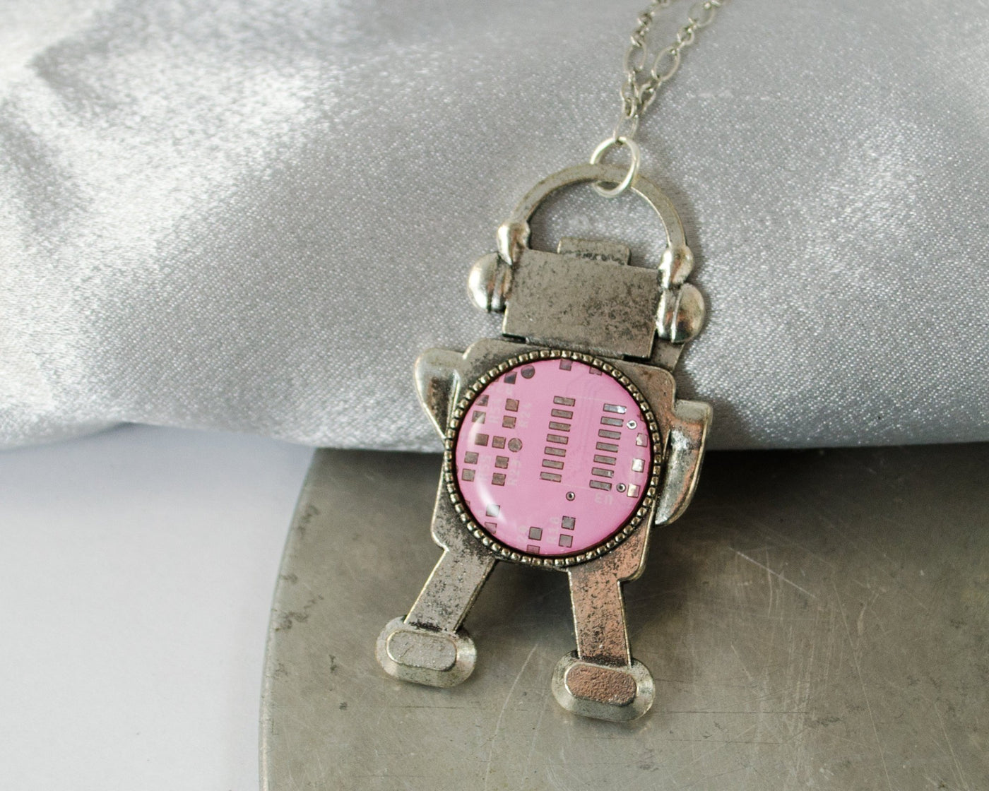 pink circuit board robot necklace