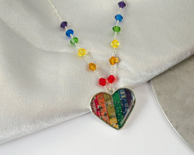 handmade rainbow heart necklace made from upcycled circuit boards with beaded detail