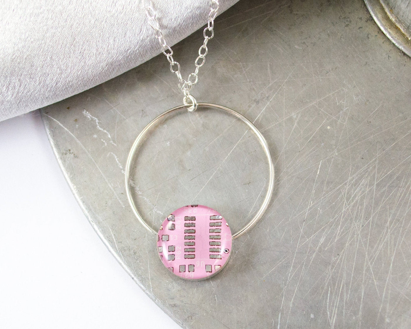 pink circuit board necklace hand fabricated from sterling silver