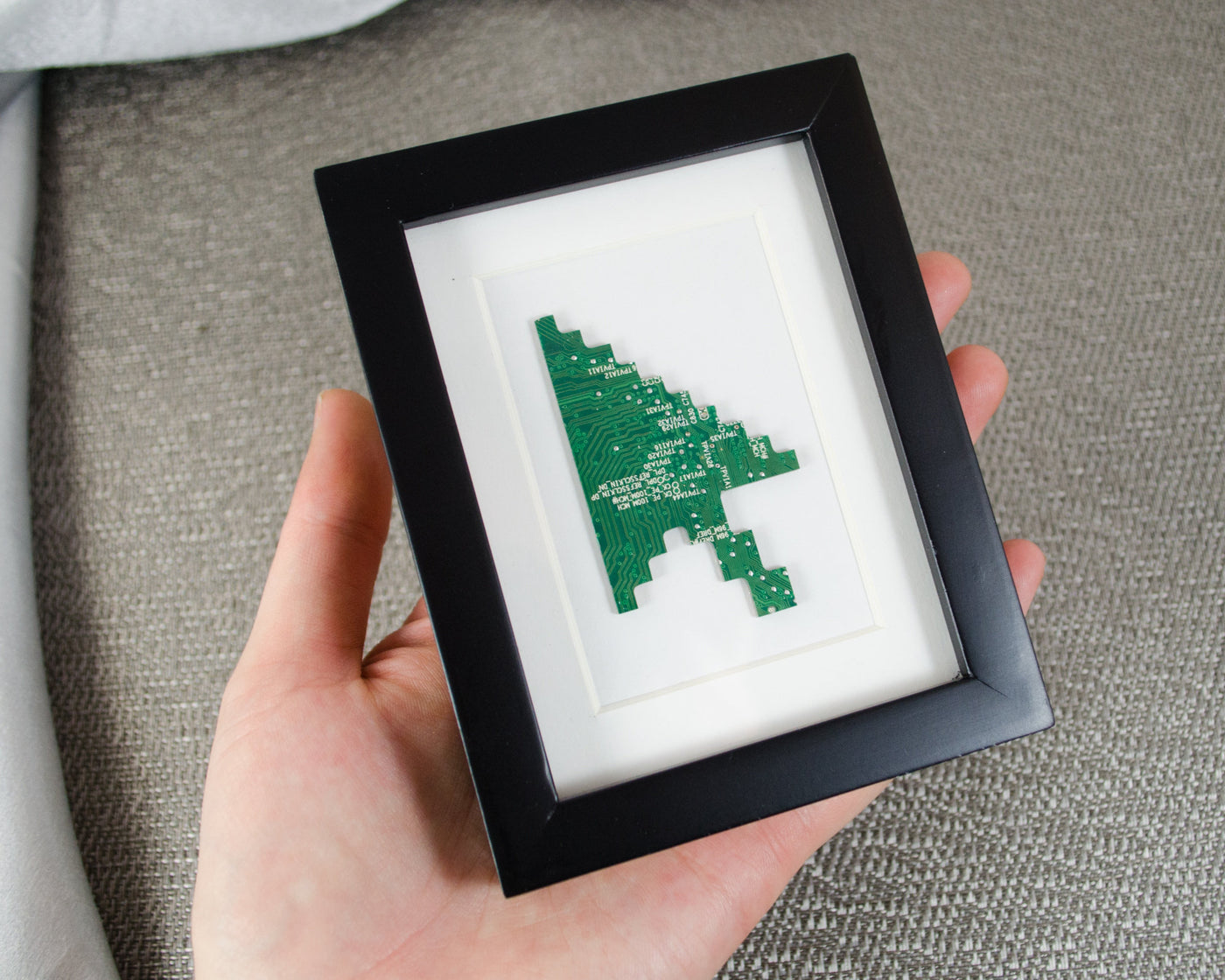 pixelated cursor art handmade from recycled circuit board