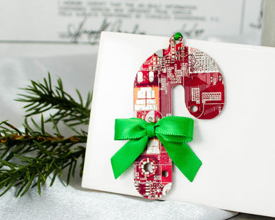 red and green candy cane ornament made from recycled circuit board