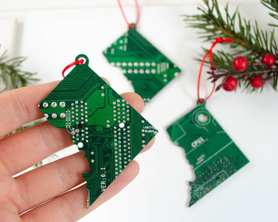 ornament shaped like washington dc made from upcycled green circuit board