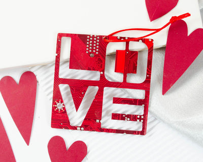 handmade love ornament made from red circuit board