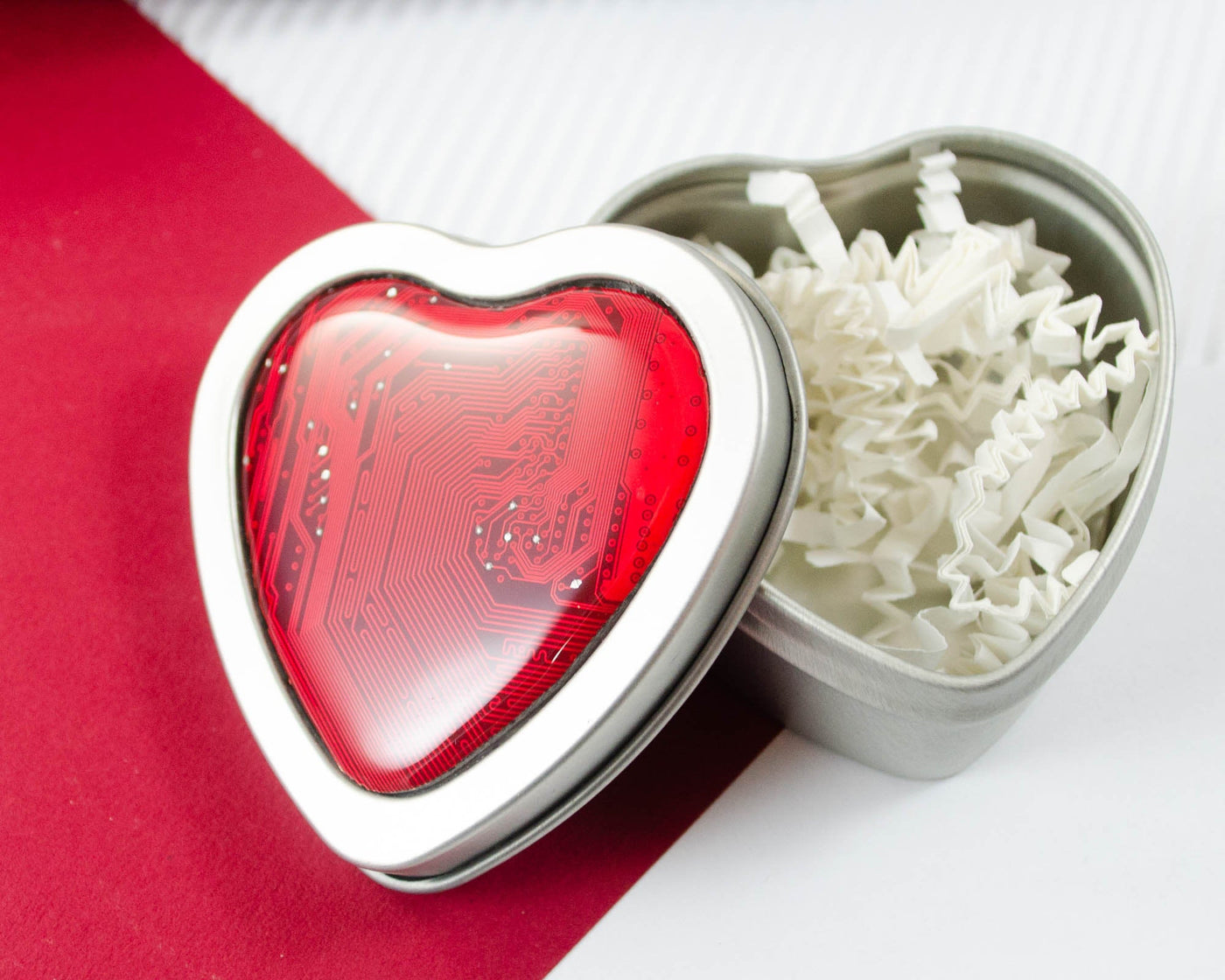 heart shaped tin with red circuit board decoration