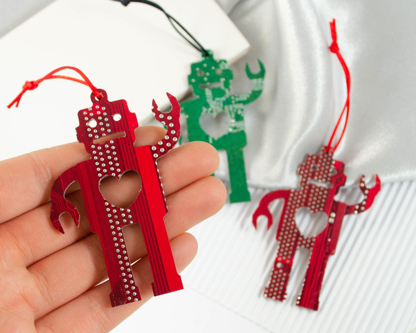 handmade robot ornaments made from recycled circuit boards