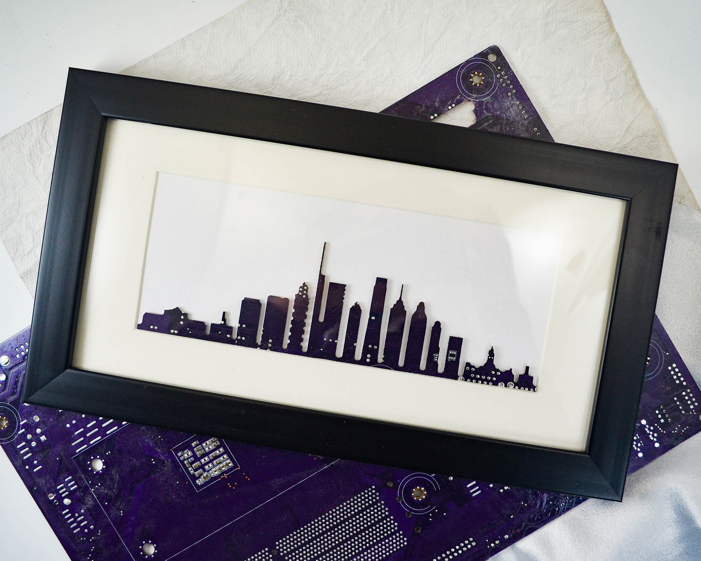 handmade circuit board skyline framed art