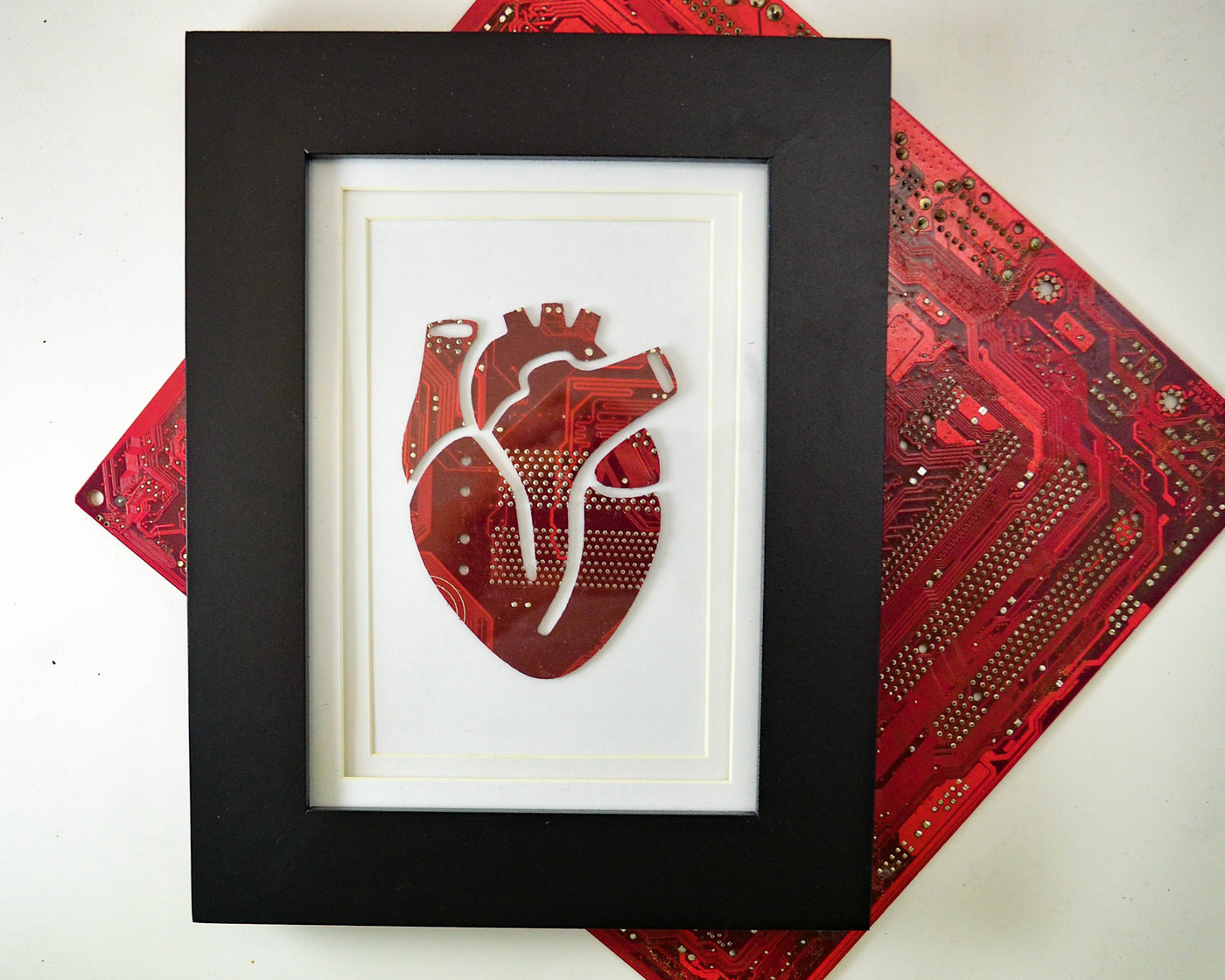 framed anatomical heart art made from recycled circuit boards