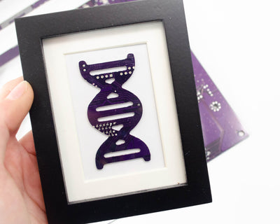 mini framed art made from circuit board and shaped into dna