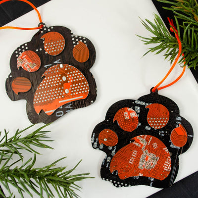 handmade recycled circuit board ornament made from orange and brown motherboards shaped like a tiger paw