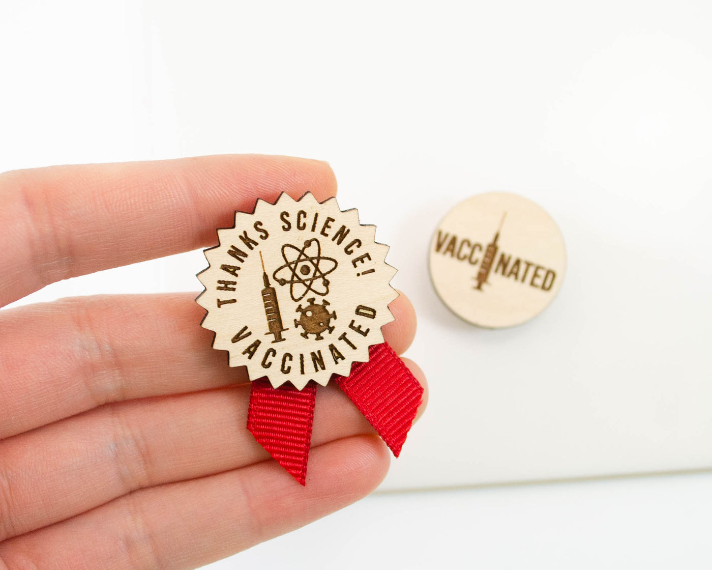 vaccination vaccine pin that says thanks science made from wood